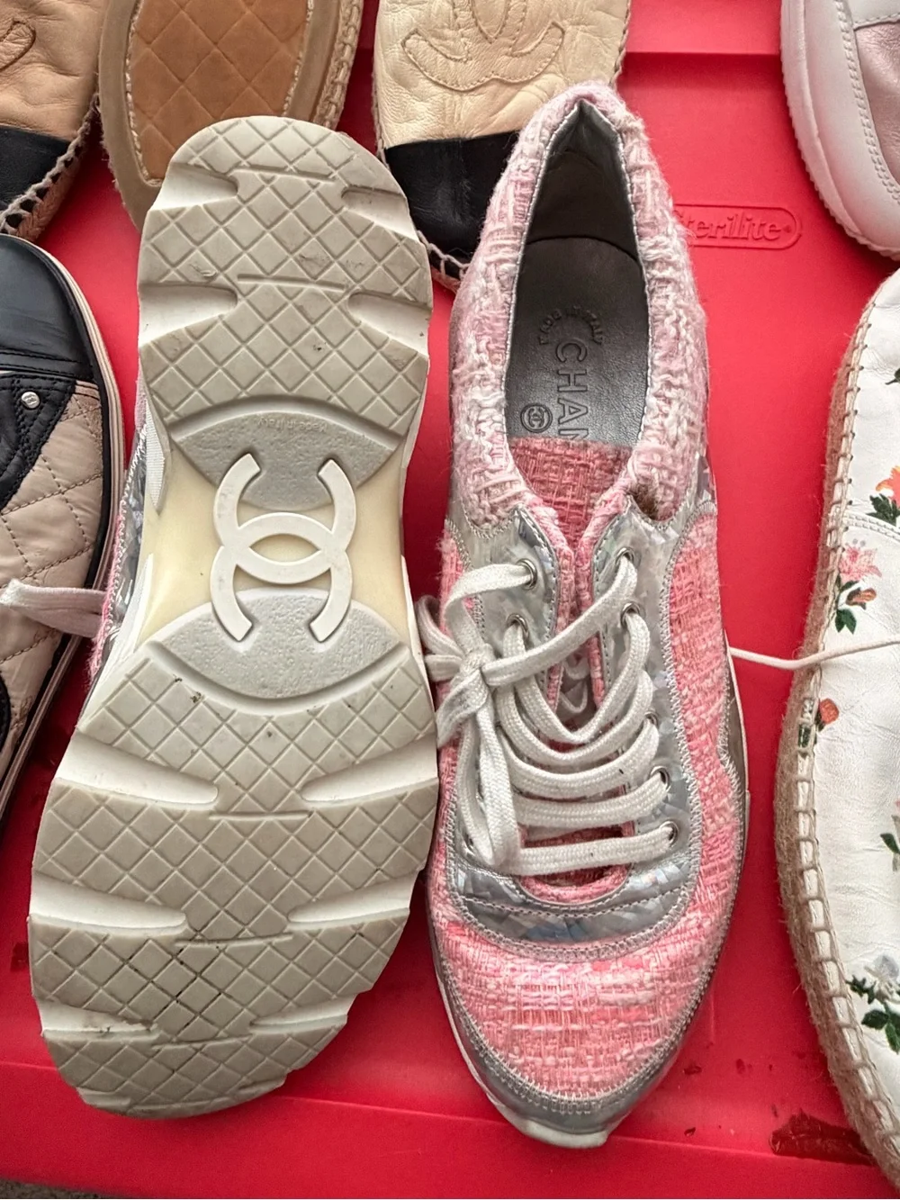 Chanel pink tweed trainers.